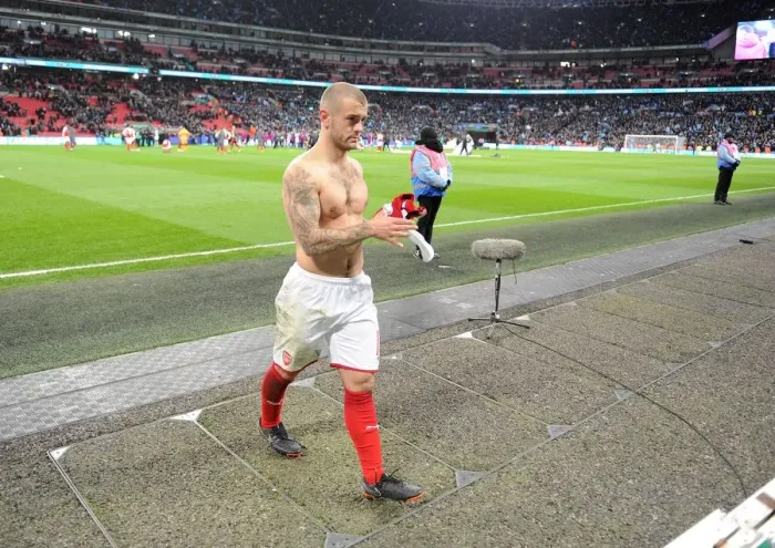 Framed Print : Jack Wilshere's Heartfelt Gesture: Throwing His Shirt to a Fan Amidst Manchester City's Carabao Cup Victory Framed Print : Jack Wilshere's Heartfelt Gesture: Throwing His Shirt to a Fan Amidst Manchester City's Carabao Cup Victory