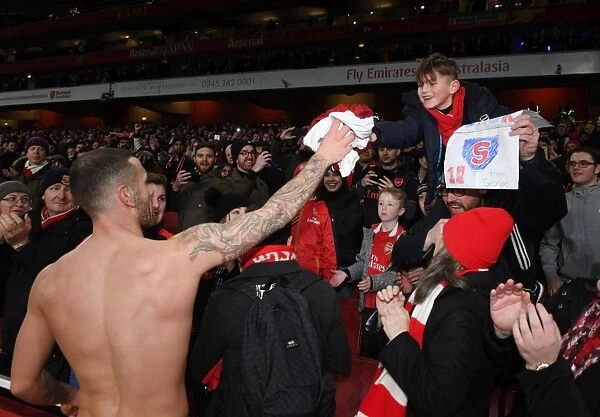 Jack Wilshere's Heartfelt Moment: Arsenal Fan Receives Player's Shirt after Carabao Cup Semi-Final
