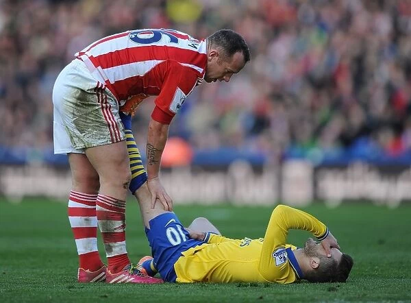 Jack Wilshere's Injury Woes: Charlie Adam Consoles the Arsenal Star During Stoke vs Arsenal Match (2013-14)