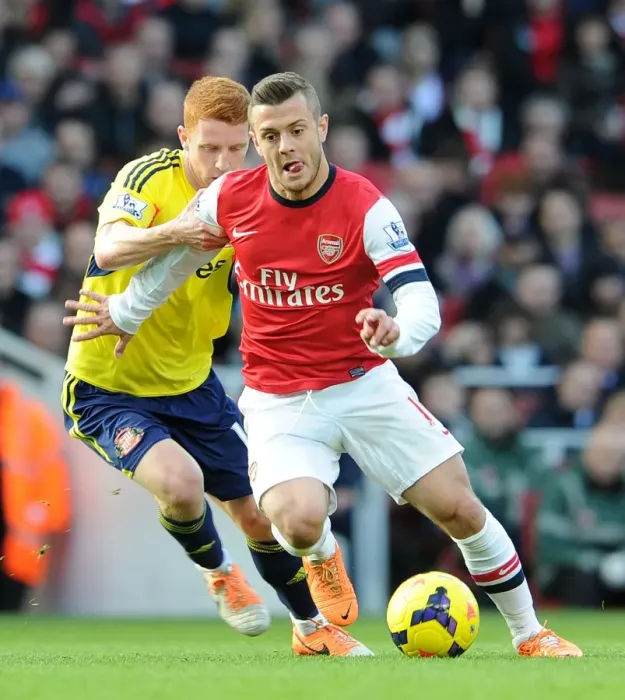 Framed Print : Jack Wilshere's Magic: Outmaneuvering Jack Colback in Arsenal's Premier League Victory (2013-14)