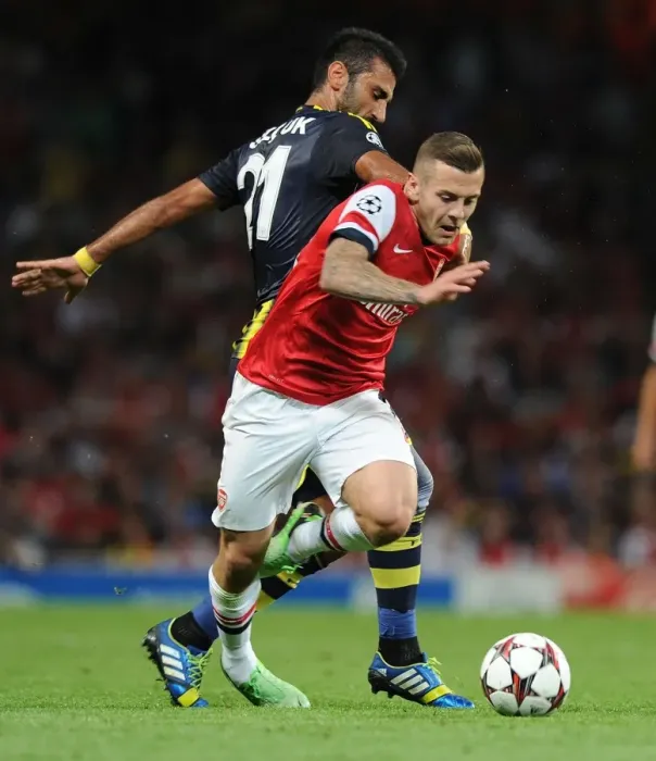 Framed Print : Jack Wilshere's Overpowering Moment: Arsenal's Champions League Triumph over Selcuk Sahin (2013)