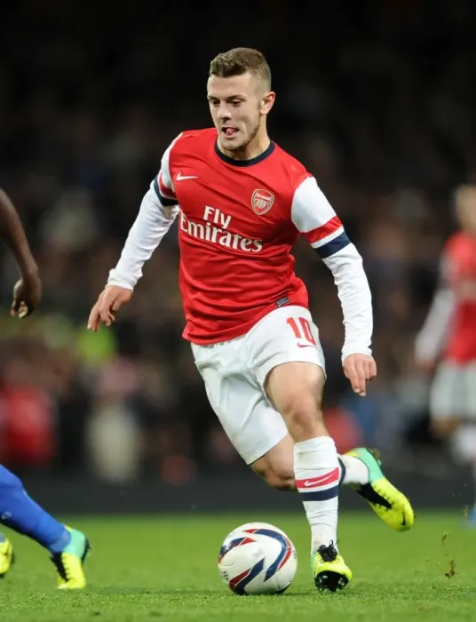 Framed Print : Jack Wilshere's Unwavering Determination: Arsenal's Battle Against Chelsea in the Capital One Cup Framed Print : Jack Wilshere's Unwavering Determination: Arsenal's Battle Against Chelsea in the Capital One Cup