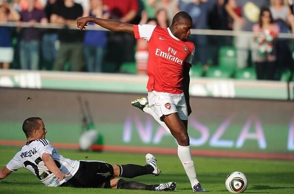 Jay Emmanuel Thomas breaks past Srda Knezevic to score the 5th Arsenal goal