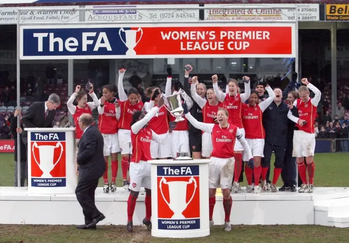 Framed Print : Jayne Ludlow and Anita Asante lift the League Cup Trophy for Arsenal