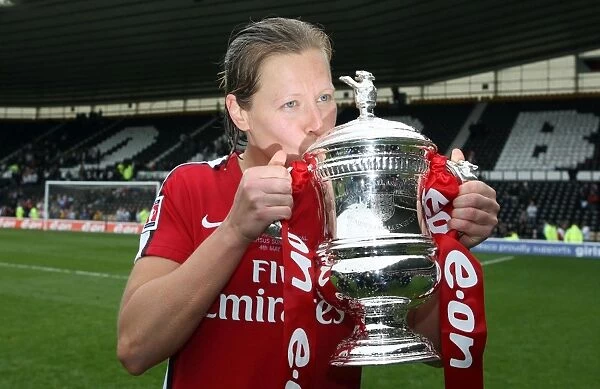 Jayne Ludlow (Arsenal) with the FA Cup Trophy