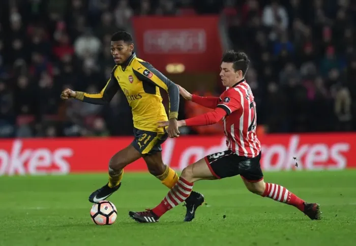 Framed Print : Jeff Reine-Adelaide vs Jack Stephens: Clash in the FA Cup Fourth Round - Southampton vs Arsenal Framed Print : Jeff Reine-Adelaide vs Jack Stephens: Clash in the FA Cup Fourth Round - Southampton vs Arsenal
