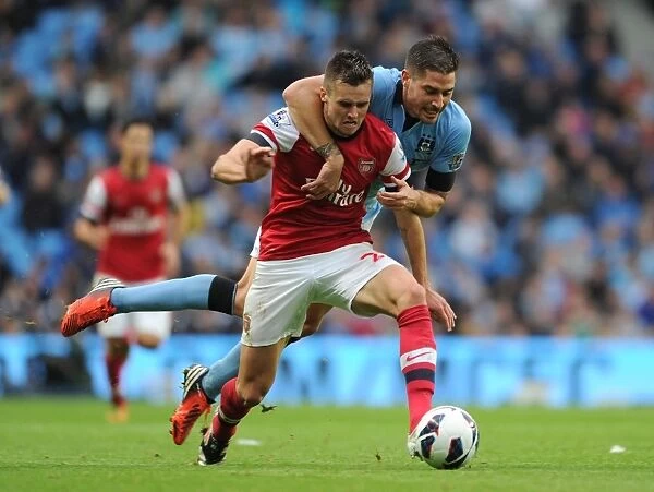 Jenkinson vs Garcia: A Battle at the Etihad - Manchester City vs Arsenal: 1-1 Stalemate in the Premier League