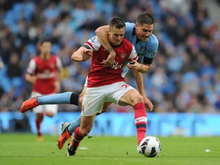 Framed Print : Jenkinson vs Garcia: A Battle at the Etihad - Manchester City vs Arsenal: 1-1 Stalemate in the Premier League Framed Print : Jenkinson vs Garcia: A Battle at the Etihad - Manchester City vs Arsenal: 1-1 Stalemate in the Premier League