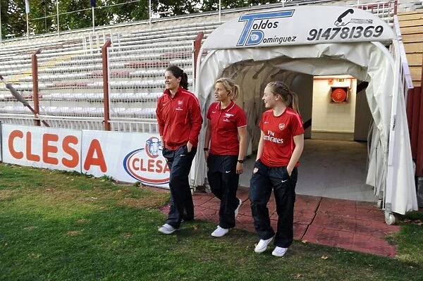 Jennifer Beattie, Gilly Flaherty and Kim Little (Arsenal) check out the pitch before the match