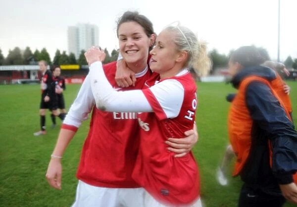 Jennifer Beattie and Steph Houghton (Arsenal) celebrate winning the match