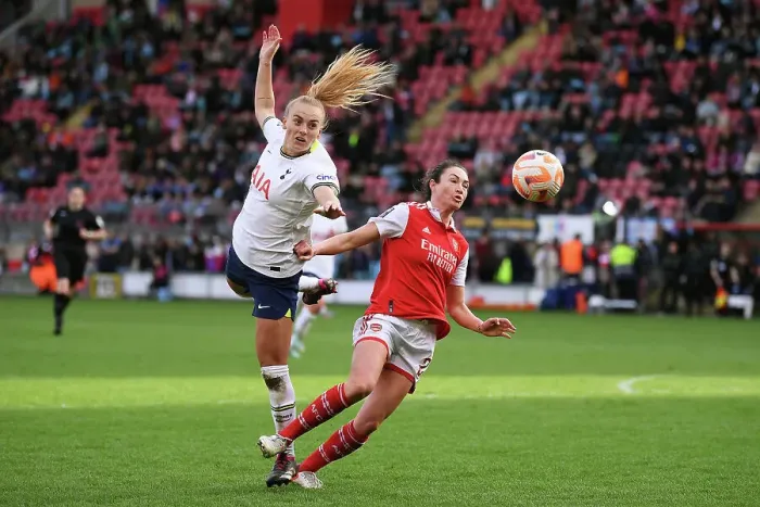 Framed Print : Jodie Taylor vs Molly Bartrip: Battle for Possession in Tottenham Hotspur vs Arsenal Women's Super League Clash Framed Print : Jodie Taylor vs Molly Bartrip: Battle for Possession in Tottenham Hotspur vs Arsenal Women's Super League Clash