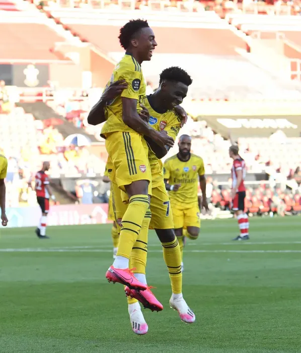 Framed Print : Joe Willock and Bukayo Saka Celebrate Arsenal's Winning Goals Against Southampton (2019-20)