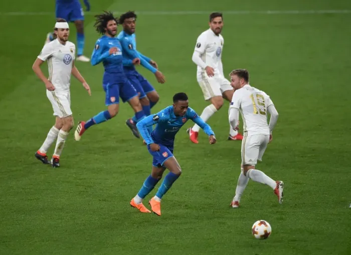 Framed Print : Joe Willock vs. Dennis Widgren: A Europa League Battle at the Emirates