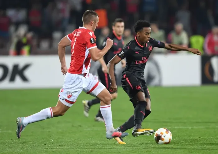 Framed Print : Joe Willock vs. Nenad Krsticic: Battle in the Europa League between Arsenal and Red Star Belgrade