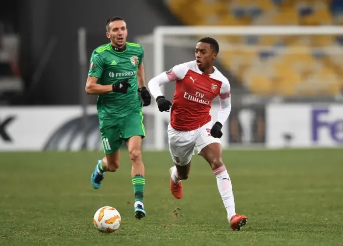 Framed Print : Joe Willock vs. Vyacheslav Sharpar: Clash in the Europa League between Arsenal's Young Gun and FC Vorskla Poltava's Defender Framed Print : Joe Willock vs. Vyacheslav Sharpar: Clash in the Europa League between Arsenal's Young Gun and FC Vorskla Poltava's Defender