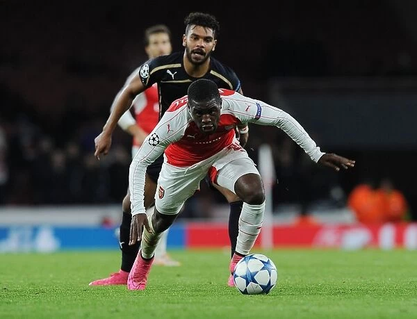 Joel Campbell Outmaneuvers El Arabi Hilal Soudani: Arsenal's Masterful Moment in 2015-16 Champions League Clash