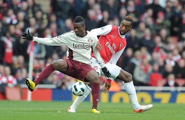 Johan Djourou (Arsenal) Asamoah Gyan (Sunderland). Arsenal 0:0 Sunderland