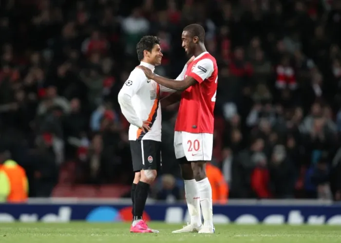 Framed Print : Johan Djourou (Arsenal) chats with Eduardo (Shaktar) the former Arsenal player after the match