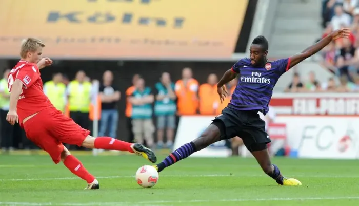 Framed Print : Johan Djourou (Arsenal) Kacper Przybylko (Cologne). Cologne 0: 4 Arsenal
