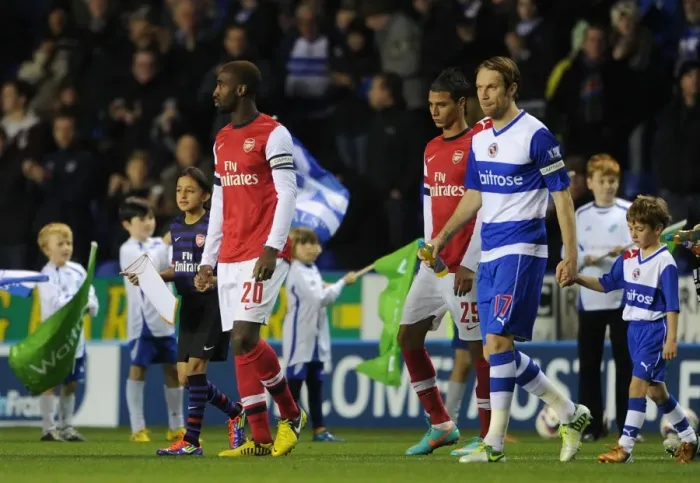 Framed Print : Johan Djourou (Arsenal) with the mascot. Reading 5: 7 Arsenal. Capital One Cup