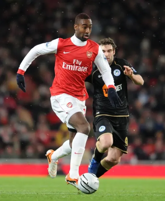 Framed Print : Johan Djourou (Arsenal) Mauro Boselli (Wigan). Arsenal 2: 0 Wigan Athletic
