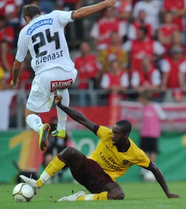 Framed Print : Johan Djourou (Arsenal) Roman Kienast (Sturm Graz). Sturm Graz 0: 4 Arsenal