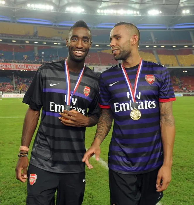 Framed Print : Johan Djourou and Kyle Bartley (Arsenal). Malaysia 1: 2 Arsenal. Pre Season Friendly Framed Print : Johan Djourou and Kyle Bartley (Arsenal). Malaysia 1: 2 Arsenal. Pre Season Friendly