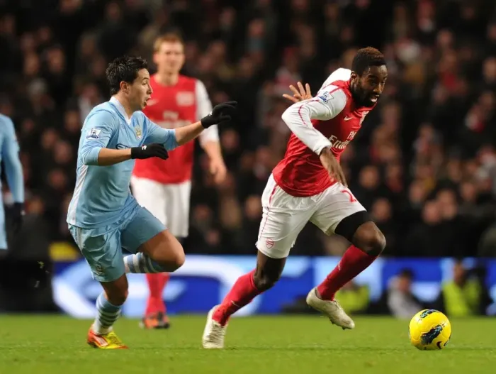 Framed Print : Johan Djourou vs. Samir Nasri: Battle at the Etihad - Manchester City vs. Arsenal, Premier League, 2011