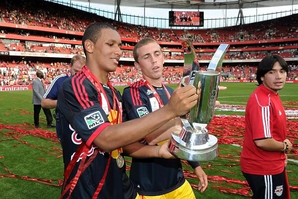 Juan Agudelo and John Rooney (Red Bulls) with the Emirates Cup Trophy. Arsenal 1