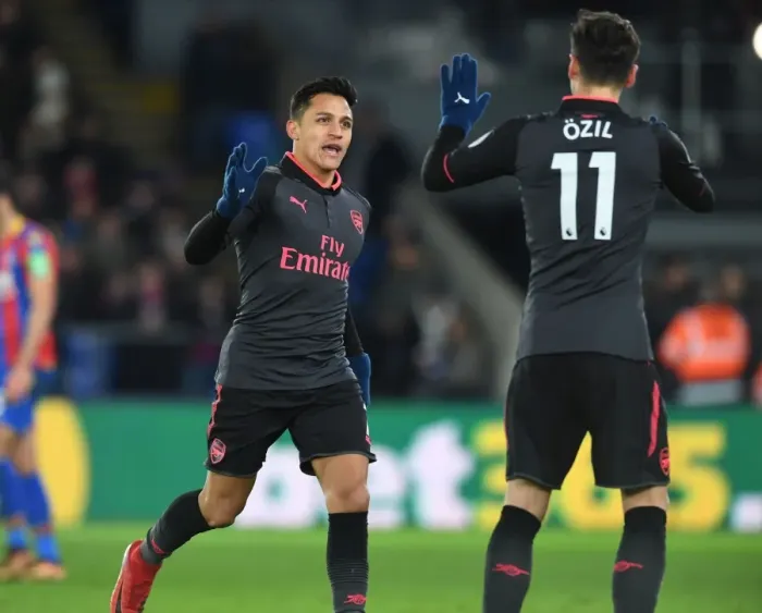 Framed Print : Jubilant Moment: Sanchez and Ozil's Euphoric Goal Celebration for Arsenal vs Crystal Palace (2017-18)