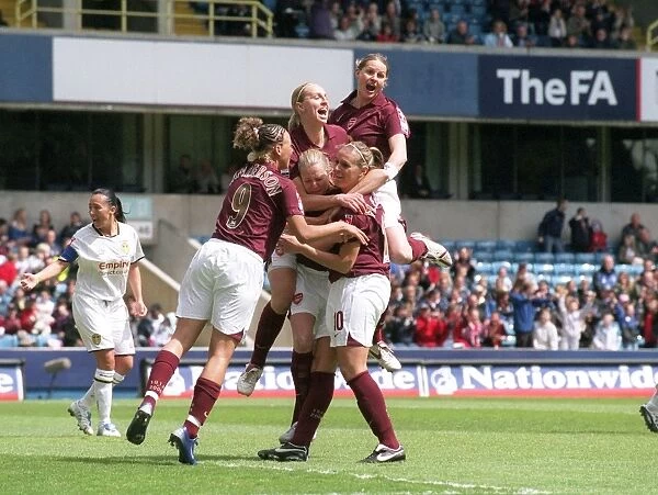 Julie Fleeting celebrates Arsenals 1st goal, an own goal by Leeds