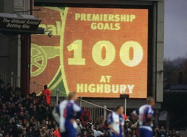 The jumbotron informs the fans that Thierry Henry has scored 100 Premiership goals at Highbury