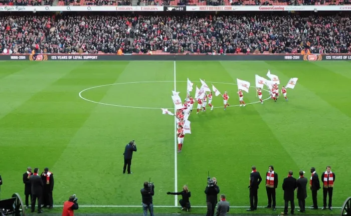Framed Print : Junior Gunner on the pitch before the match. Arsenal 1: 0 Everton. Barclays Premier League Framed Print : Junior Gunner on the pitch before the match. Arsenal 1: 0 Everton. Barclays Premier League