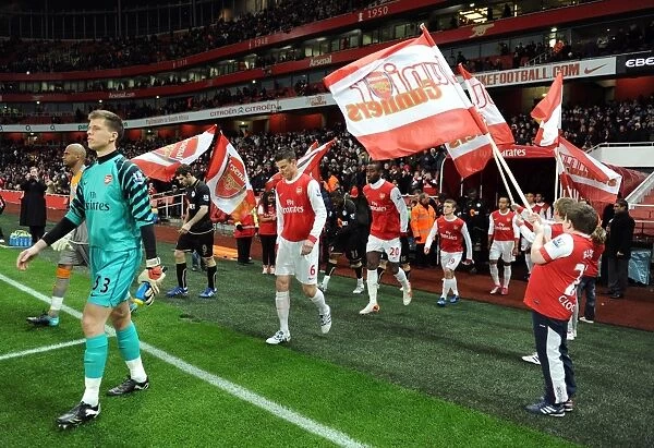 The Junoir Gunners do a guard of honour as the teams walk out. Arsenal 2: 0 Wigan Athletic