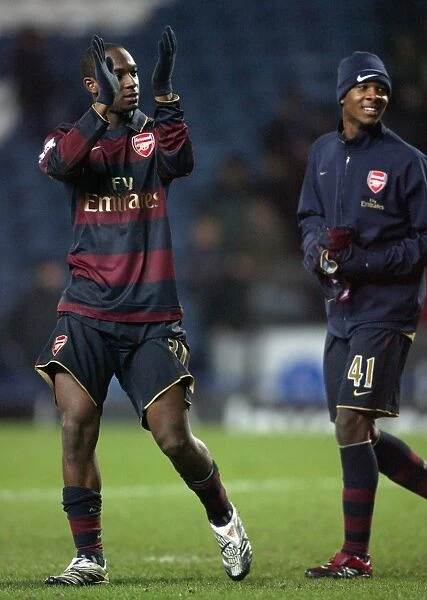 Justin Hoyte and Gavin Hoyte (Arsenal) celebrate at the end of the match