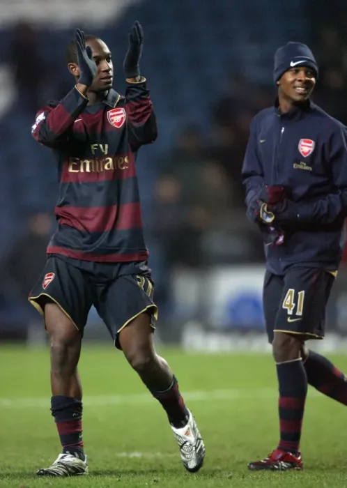 Framed Print : Justin Hoyte and Gavin Hoyte (Arsenal) celebrate at the end of the match