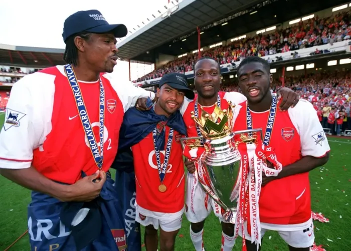 Framed Print : Kanu, Ashley Cole, Lauren and Kolo Toure (Arsenal) with the Premiership Trophy Framed Print : Kanu, Ashley Cole, Lauren and Kolo Toure (Arsenal) with the Premiership Trophy
