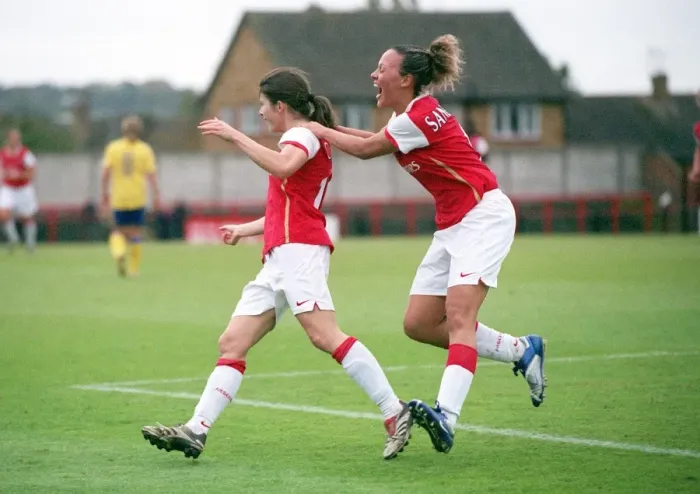 Framed Print : Karen Carney celebrates scoring arsenals 2nd goal with Lianne Sanderson