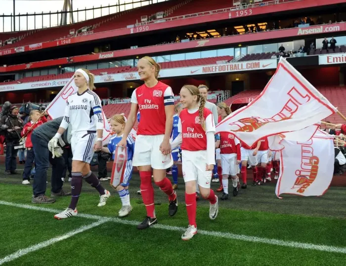 Framed Print : Katie Chapman (Arsenal Ladies) and Carly Telford (Chelsea) lead out their teams