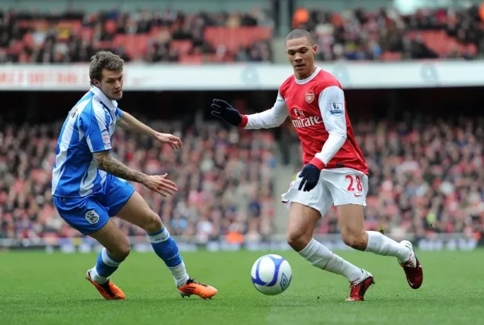 Framed Print : Kieran Gibbs (Arsenal) Karl Pilkington (Huddersfield). Arsenal 2: 1 Huddersfield Town
