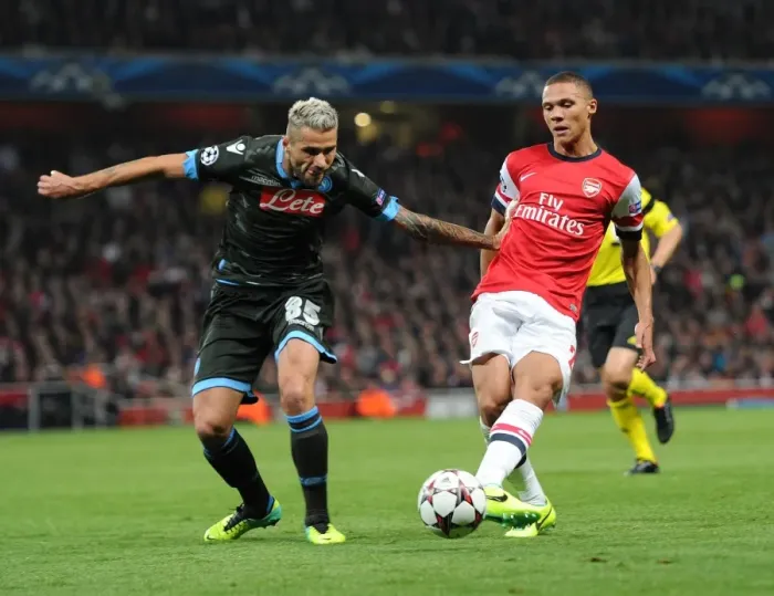 Framed Print : Kieran Gibbs (Arsenal) Valon Behrami (Napoli). Arsenal 2: 0 Napoli. UEFA Champions League Framed Print : Kieran Gibbs (Arsenal) Valon Behrami (Napoli). Arsenal 2: 0 Napoli. UEFA Champions League