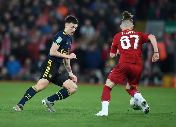 Framed Print : Kieran Tierney Closes In on Harvey Elliott: Liverpool vs Arsenal - Carabao Cup Showdown