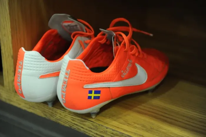 Framed Print : Kim Kallstrom (Arsenal) boots in the changingroom before the match. Arsenal 2: 2 Swansea City