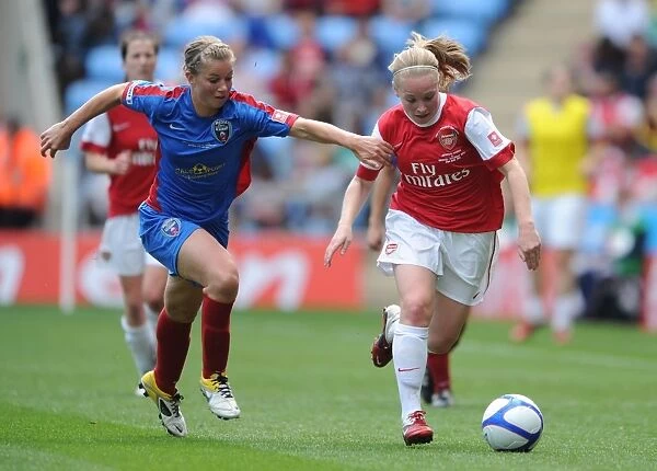 Kim Little (Arsenal) Anouk Hoogendijk (Bristol). Arsenal Ladies 2:0 Bristol Academy