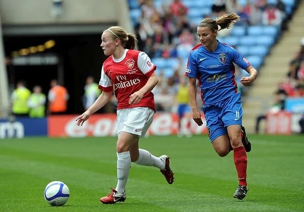 Kim Little (Arsenal) Loren Dykes (Bristol). Arsenal Ladies 2: 0 Bristol Academy