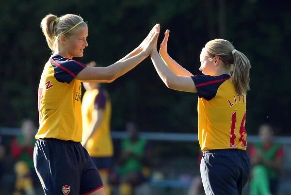 Kim Little celebrates scoring for Arsenal with Katie Chapman