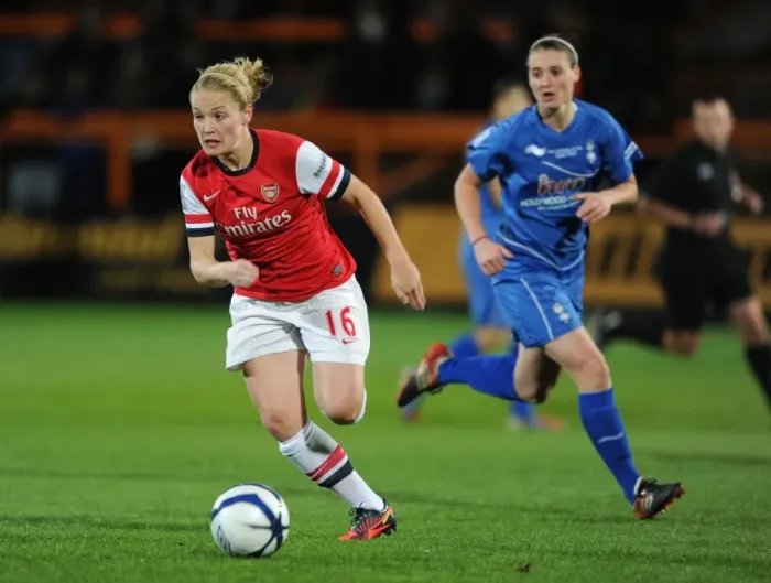 Framed Print : Kim Little Outruns Rival Jade Moore in FA WSL Continental Cup Final