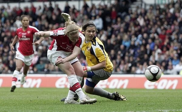 Kim Little scores Arsenals 2nd goal past Helen Alderson (Sunderland)