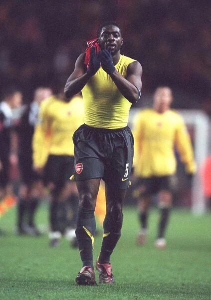Kolo Toure (Arsenal) claps the fans after the match