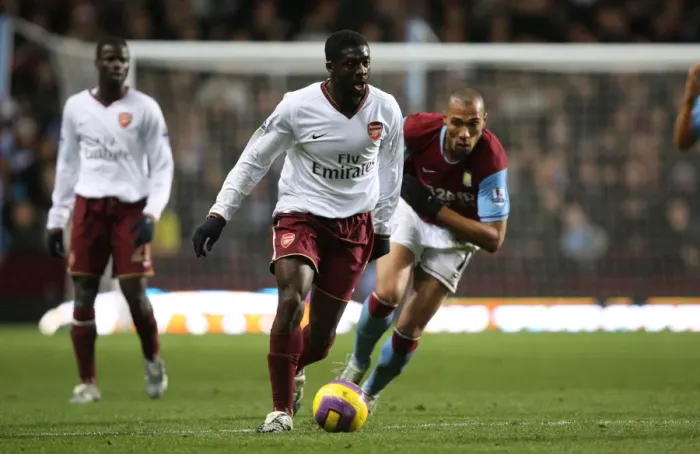 Framed Print : Kolo Toure (Arsenal) John Carew (Aston Villa)